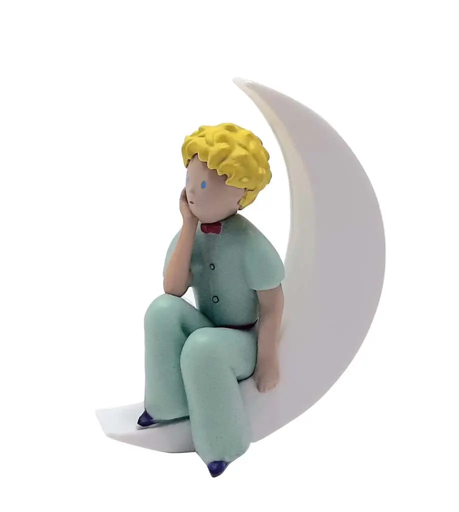 Figurine little prince sitting on the moon - Prince
